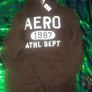 A brown Aéropostale sweater.